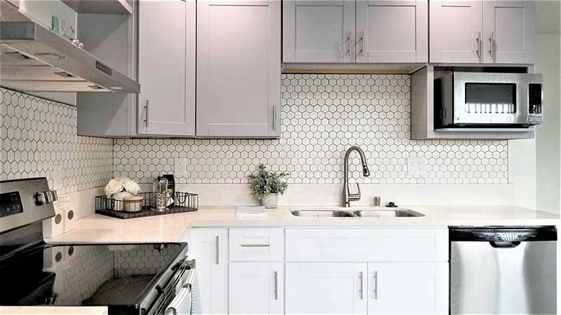 Kitchen interior photo at Bleu Apartments