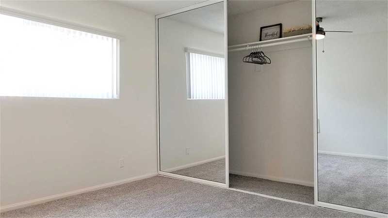 Bedroom interior photo at Bleu Apartments